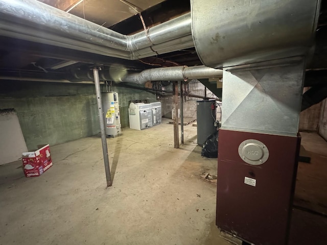 basement with gas water heater and water heater