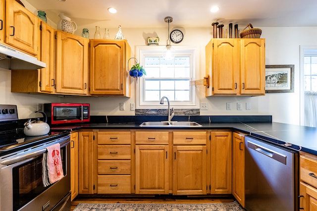 kitchen with sink and appliances with stainless steel finishes