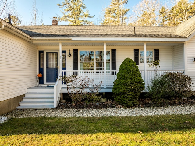 property entrance with covered porch