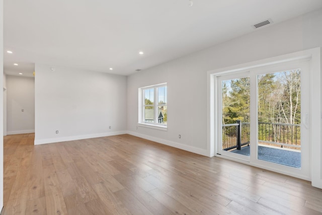 43 Rose Douglas Ln, Brunswick, ME 04011 - spare room featuring visible vents, baseboards, light wood-type flooring, and recessed lighting