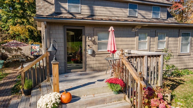 27 Mace Ave, Winthrop, ME 04364 - doorway to property featuring a wooden deck and roof with shingles