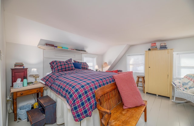 27 Mace Ave, Winthrop, ME 04364 - bedroom featuring multiple windows and vaulted ceiling