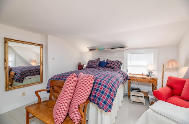 27 Mace Ave, Winthrop, ME 04364 - bedroom with lofted ceiling and baseboards