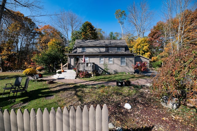 27 Mace Ave, Winthrop, ME 04364 - view of front facade featuring a front lawn