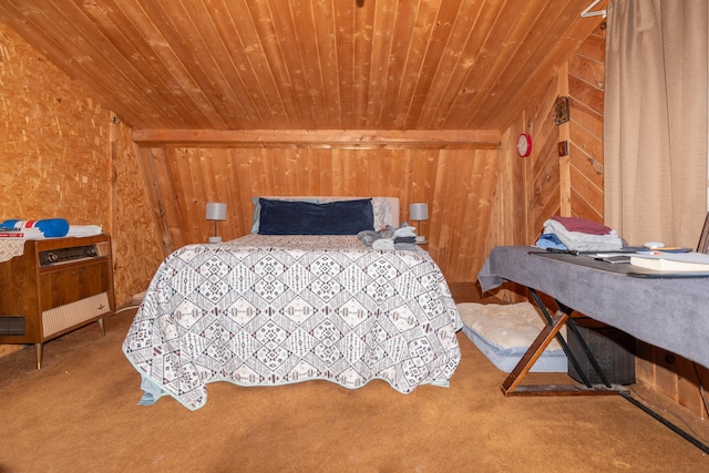 carpeted bedroom featuring wood ceiling and wood walls