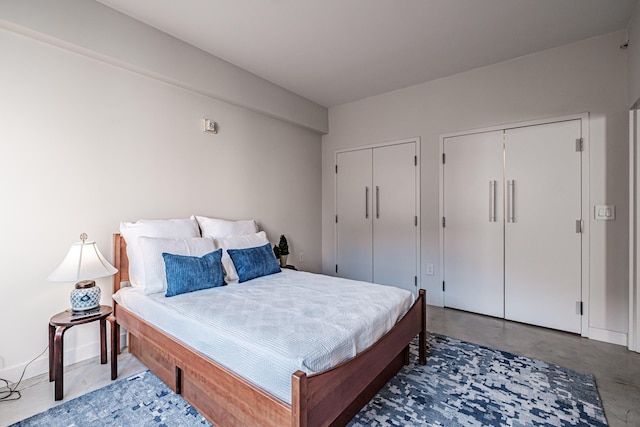 21 Chestnut St Unit 304, Portland, ME 04101 - bedroom featuring two closets and baseboards