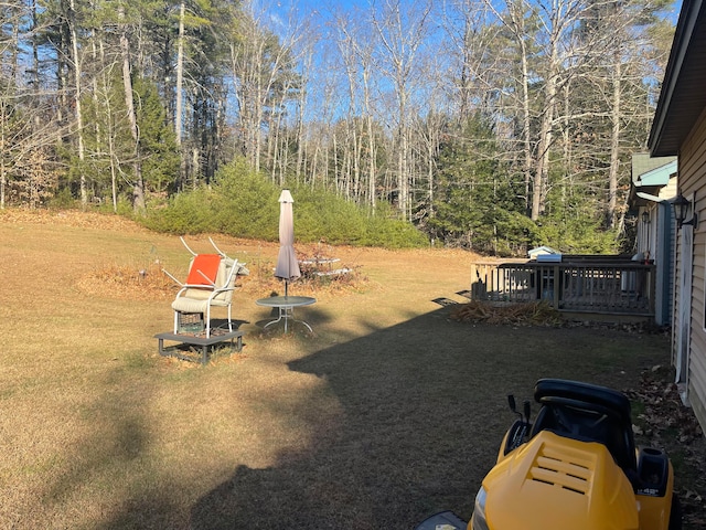 view of yard with a deck