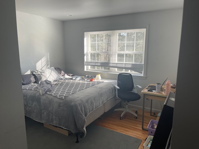 bedroom featuring hardwood / wood-style flooring