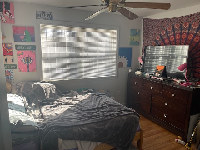 bedroom featuring ceiling fan and light wood-type flooring