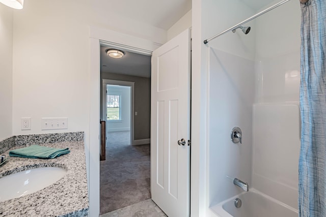 bathroom with vanity, shower / bath combo, and tile patterned floors