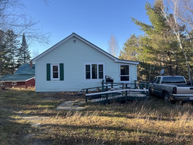 23 Hillcrest Ave, Millinocket, ME 04462 - back of property with a deck