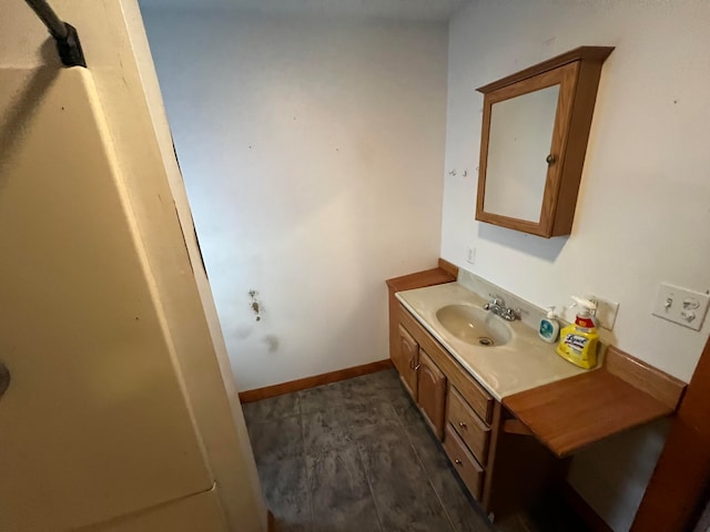 bathroom featuring vanity and hardwood / wood-style flooring