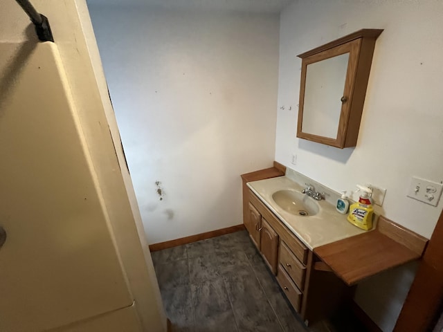 23 Hillcrest Ave, Millinocket, ME 04462 - bathroom with vanity and baseboards