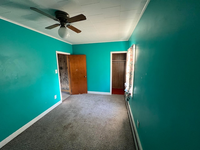 unfurnished bedroom with carpet, ceiling fan, and ornamental molding