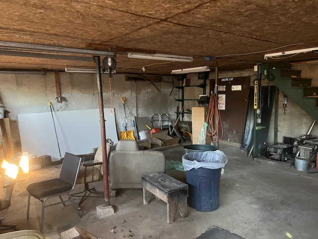 23 Hillcrest Ave, Millinocket, ME 04462 - unfinished basement featuring stairway