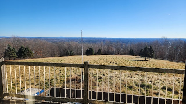 property view of mountains featuring a rural view