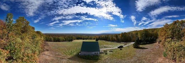 exterior space with a rural view