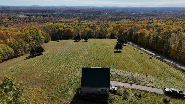 birds eye view of property with a rural view