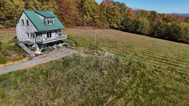 view of yard featuring a wooden deck