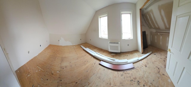 bonus room featuring lofted ceiling