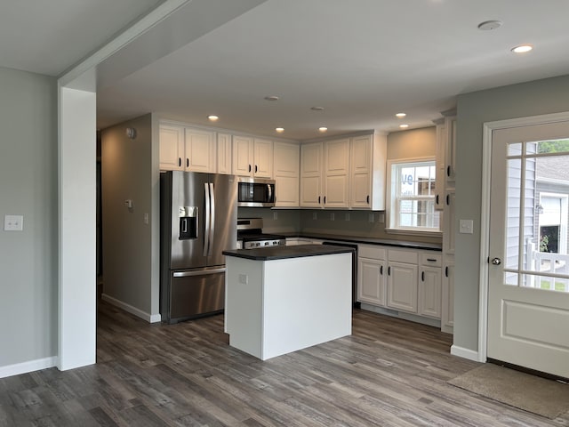 13 Mathew Way, Scarborough, ME 04074 - kitchen featuring stainless steel appliances, dark countertops, dark wood-type flooring, white cabinetry, and plenty of natural light