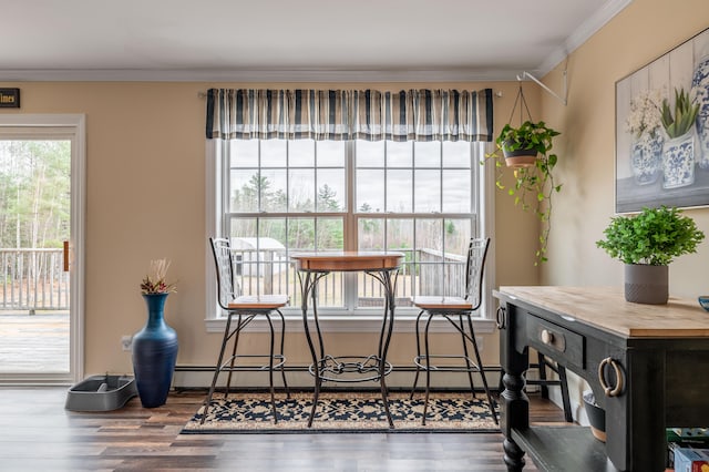 sitting room featuring wood-type flooring and ornamental molding