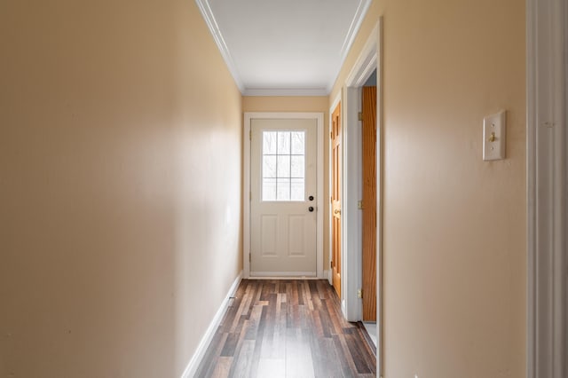 doorway to outside with dark hardwood / wood-style floors and ornamental molding