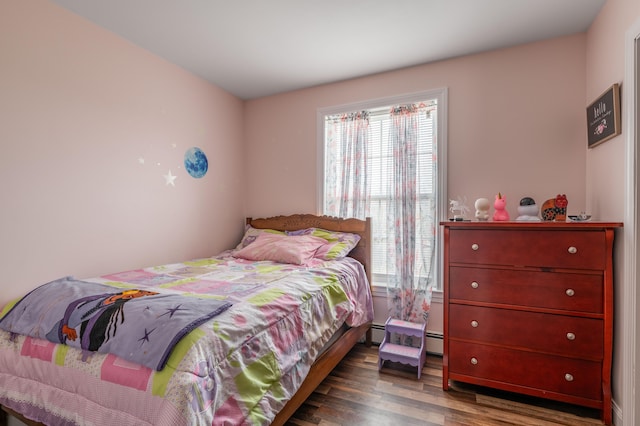 bedroom with dark hardwood / wood-style flooring