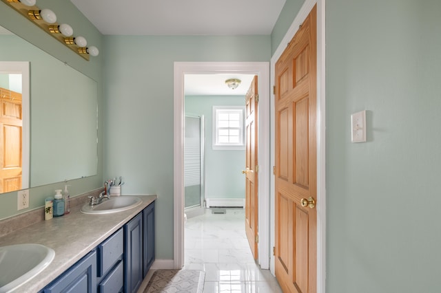 bathroom with vanity and walk in shower