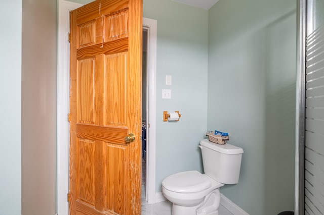 bathroom featuring toilet