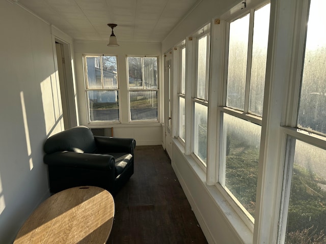 sunroom with plenty of natural light