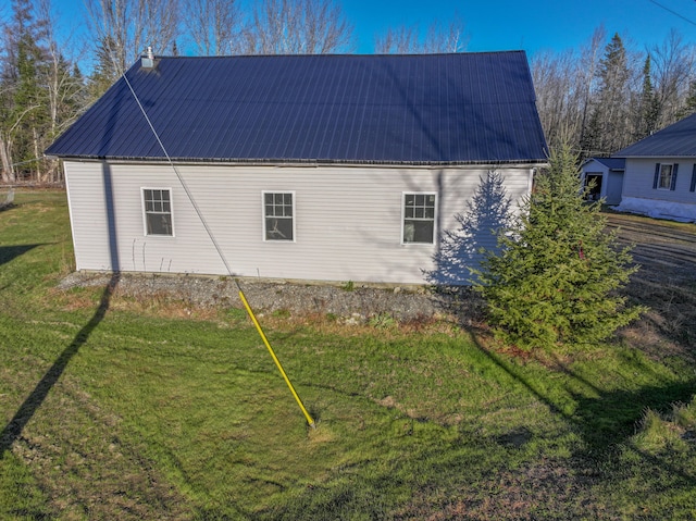 view of property exterior featuring a yard