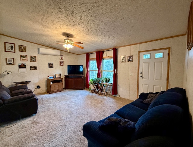 living room with ceiling fan, a wall mounted air conditioner, crown molding, carpet floors, and a textured ceiling