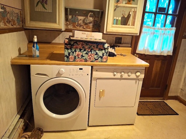 laundry room featuring separate washer and dryer