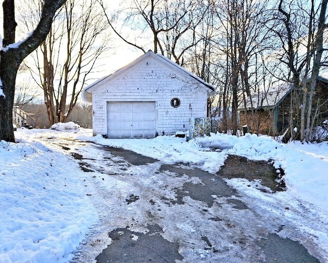 view of snow covered garage