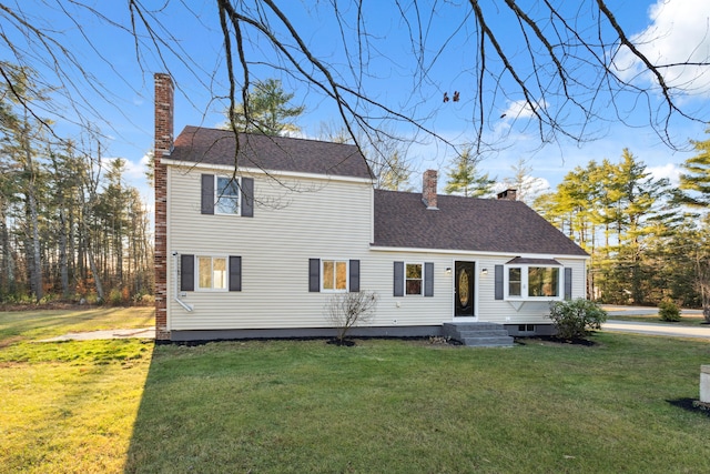 view of front of home with a front lawn