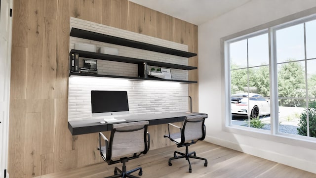 office space with light hardwood / wood-style flooring