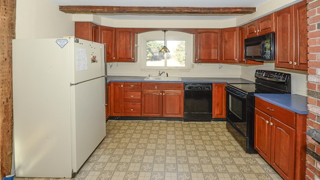 kitchen featuring black appliances, beam ceiling, and sink