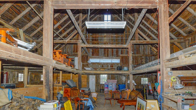 miscellaneous room featuring lofted ceiling