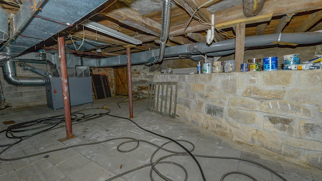 basement featuring heating unit