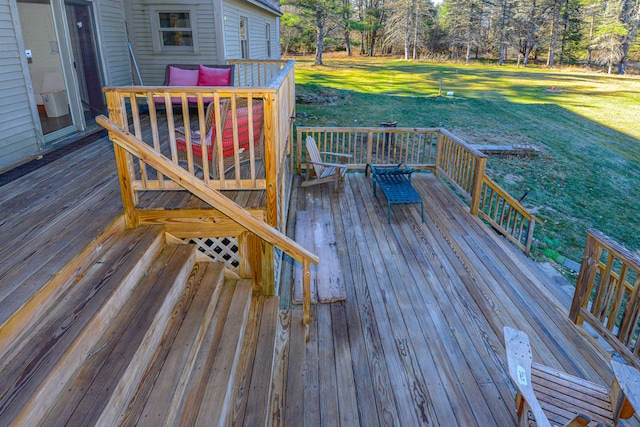 wooden terrace with a yard