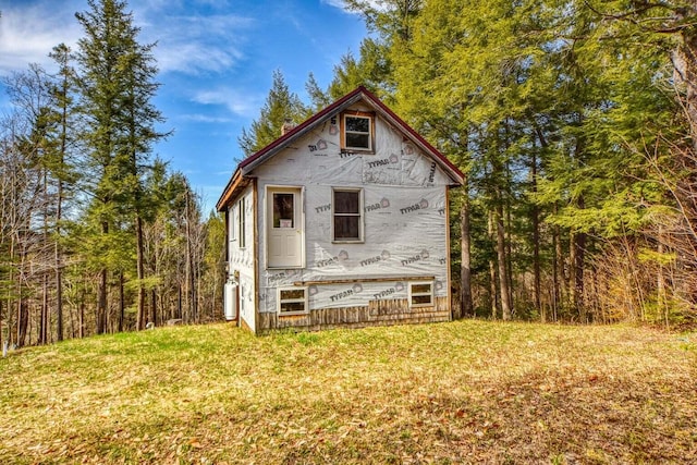 exterior space with a yard