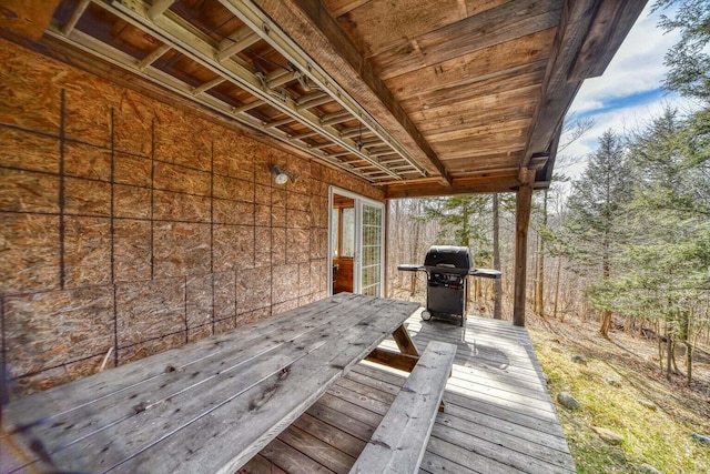 wooden terrace featuring area for grilling