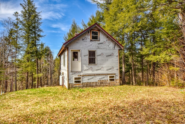 exterior space with a front yard