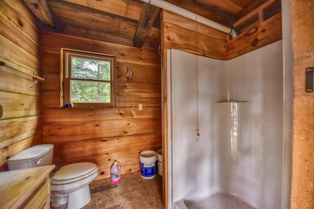 bathroom featuring a shower, beam ceiling, wooden walls, and wood ceiling