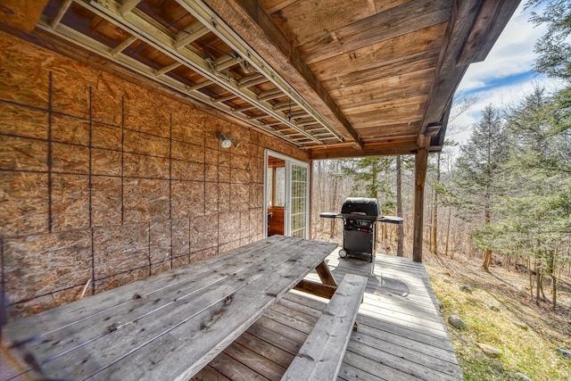 wooden terrace featuring grilling area