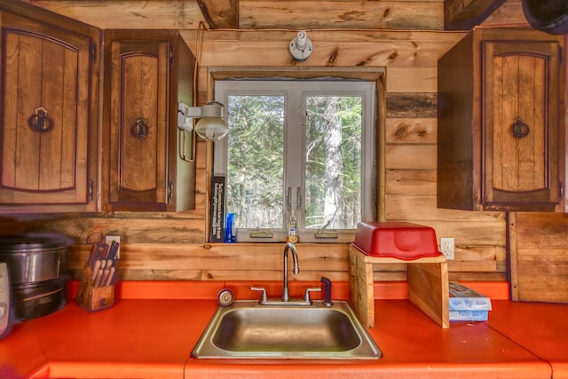 0 Little Huston Brook Rd, Concord Twp, ME 04920 - kitchen with a sink, wood walls, and brown cabinets