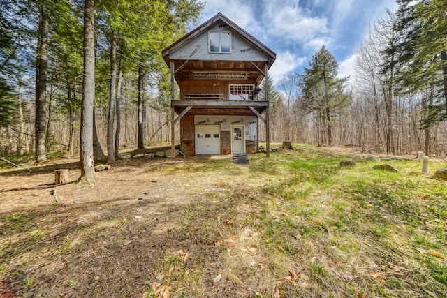 view of front of home with a balcony