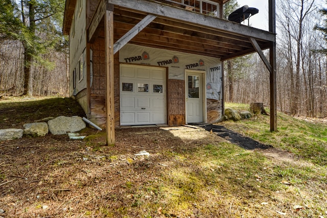 view of outbuilding featuring a garage