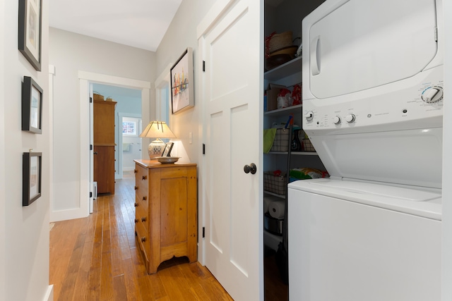 11 Beacon Dr, Brunswick, ME 04011 - washroom with light hardwood / wood-style flooring and stacked washer / drying machine